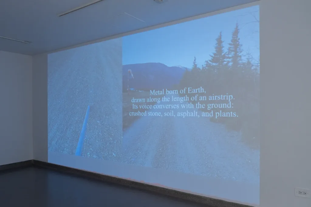 Video projection on a gallery wall.