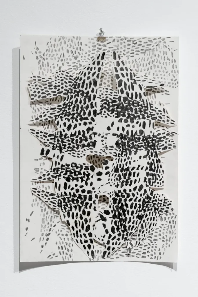 A black pattern on a white background.